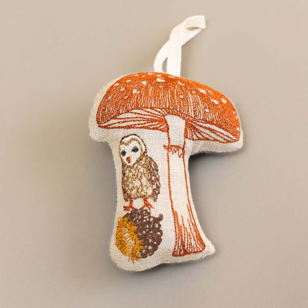 embroidered-owl-under-a-mushroom-resting-on-an-acorn-ornament