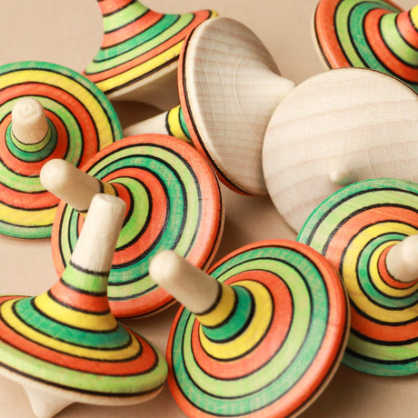 green-yellow-red-striped-wooden-spinning-tops
