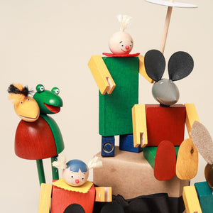 close-up-colorful-wooden-building-set-of-rollicking-family-steck-figure-set