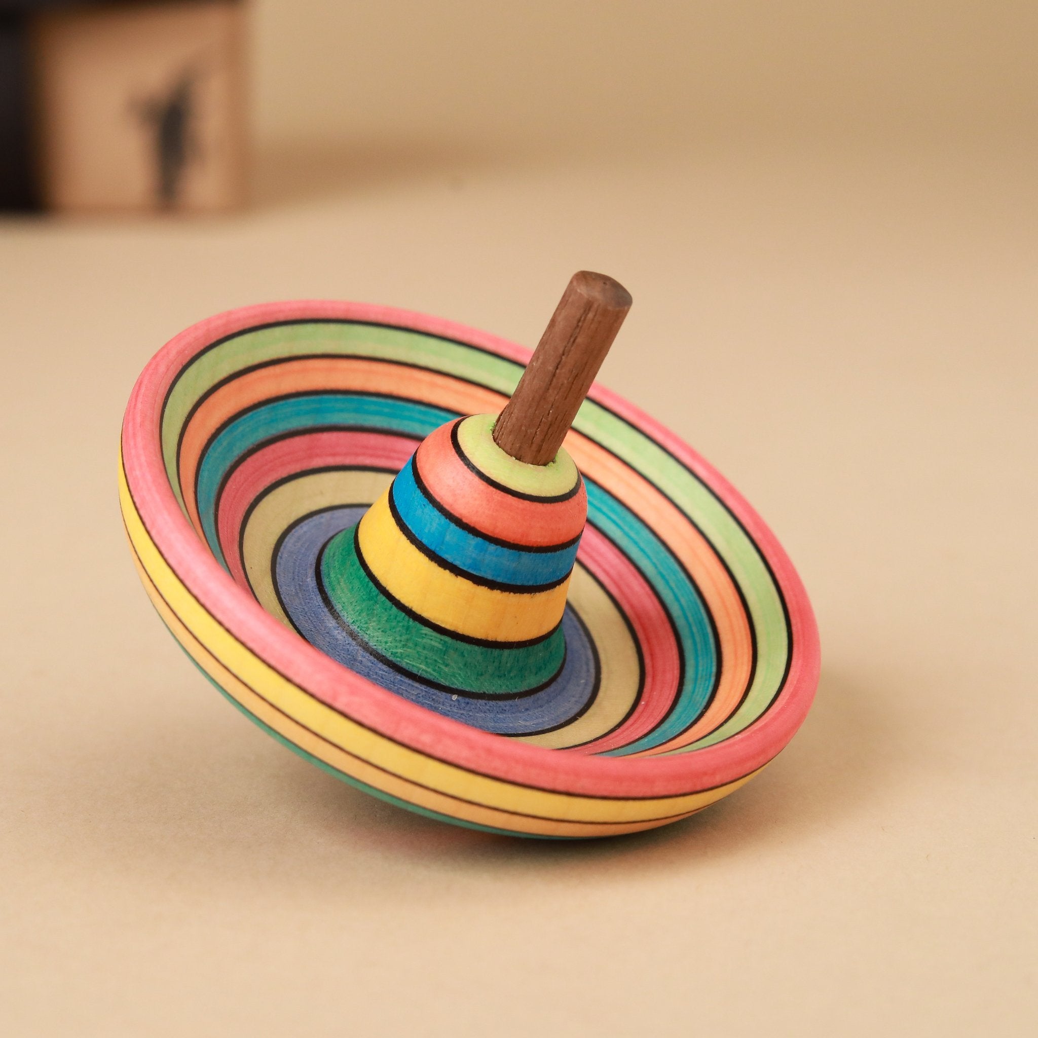 rainbow-striped-sombrero-shaped-spinning-top