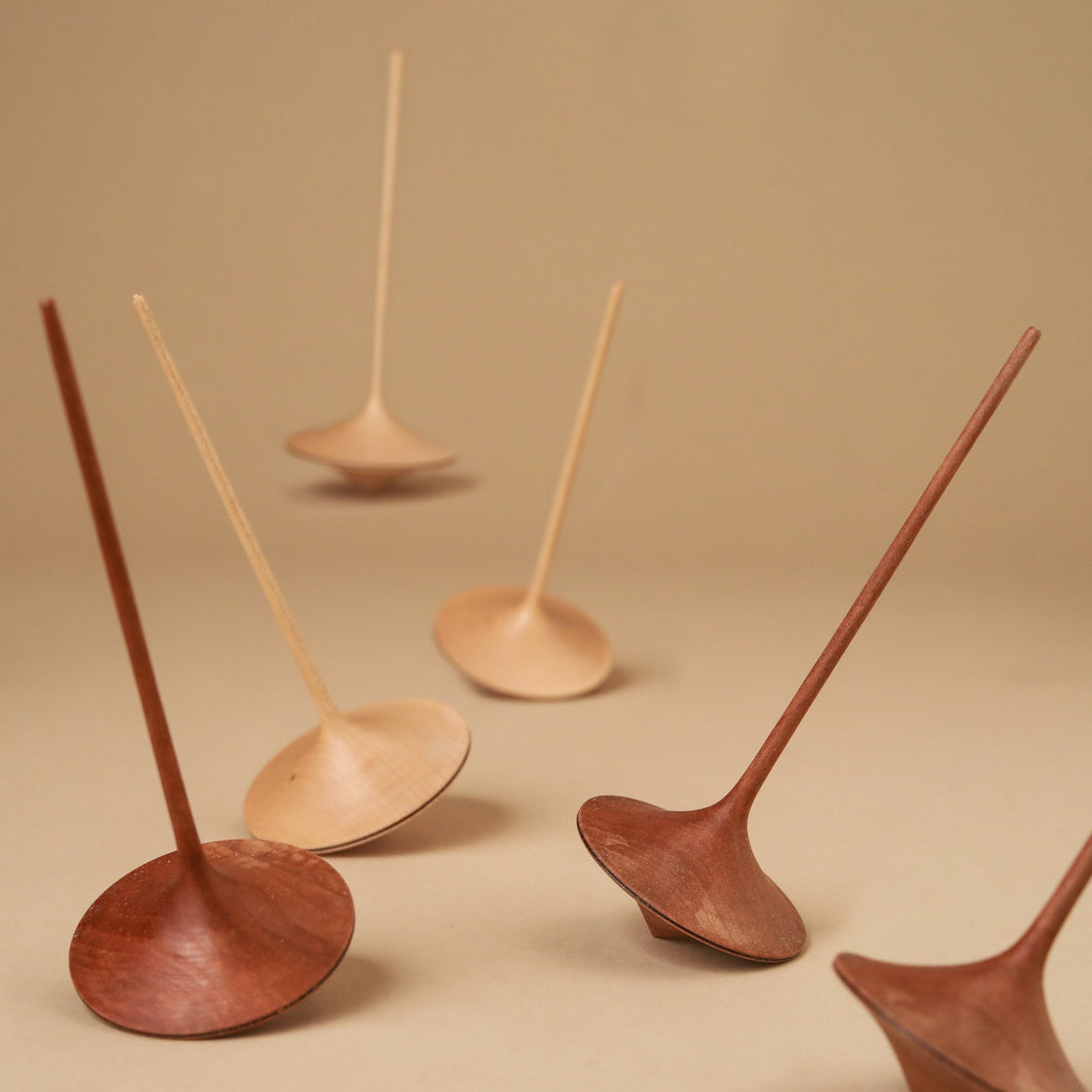 trumpo-wooden-spinning-tops-with-long-skinny-handle-in-many-finishes
