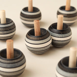 graphite-striped-upside-down-spinning-tops