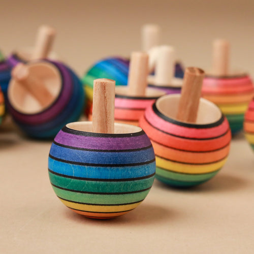 rainbow-color-striped-spinning-tops