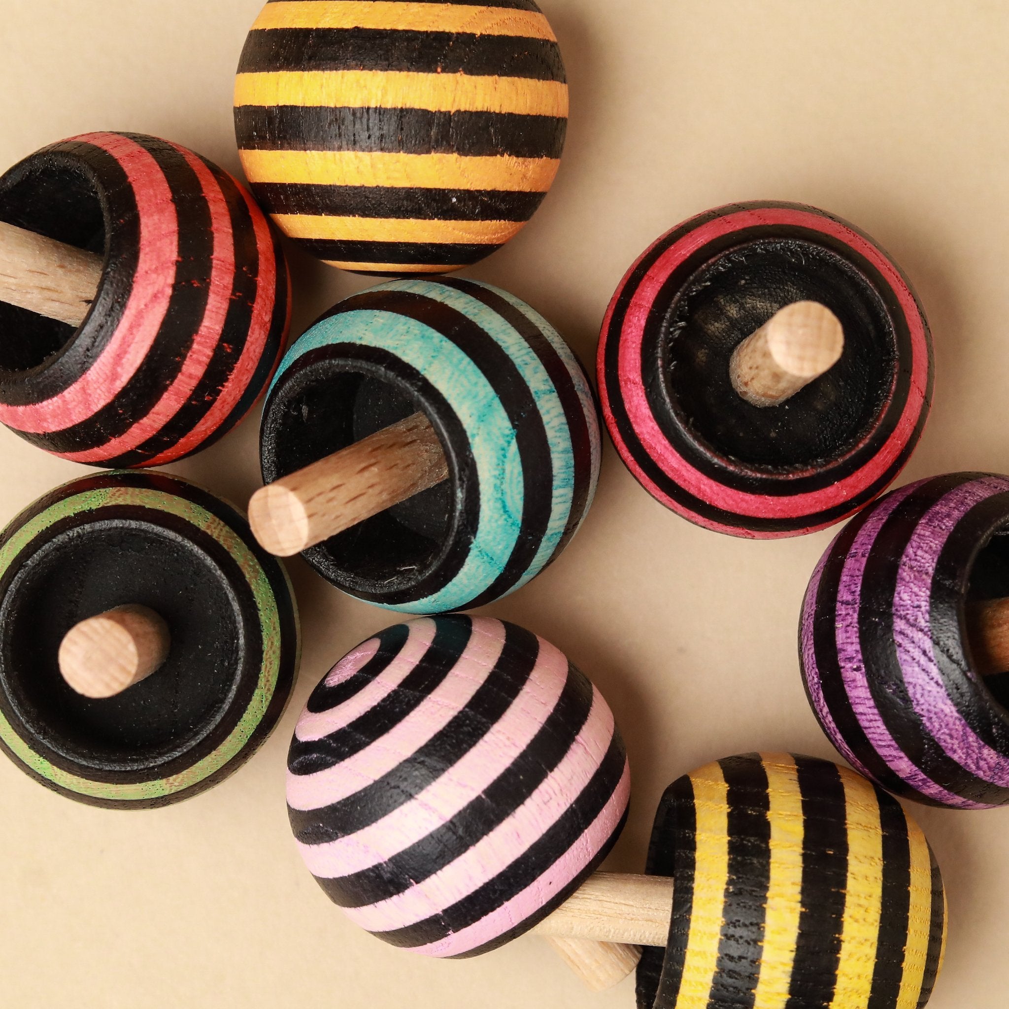 black-and-bright-striped-upside-down-spinning-tops