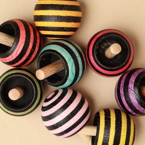 black-and-bright-striped-upside-down-spinning-tops
