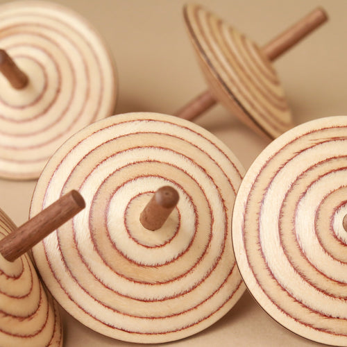 Wendelin-Wooden-Spinning-Tops-with-ring-design-on-top-and-bottom