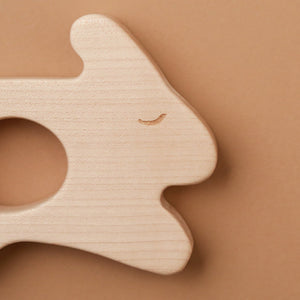 close-up-of-wooden-rabbit-teether-face