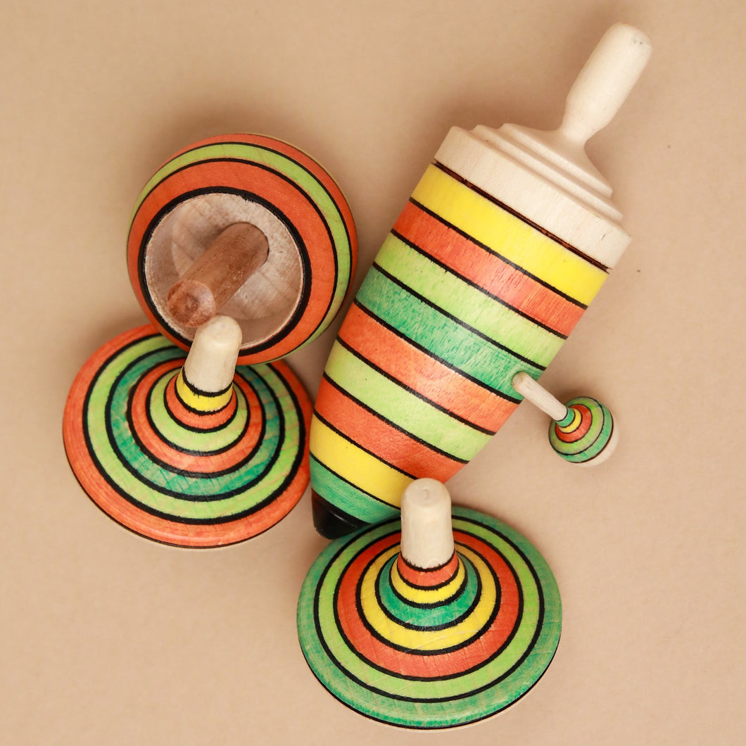 set-of-5-wooden-tops-in-different-shapes-and-sizes-in-summer-stripe-colors