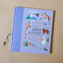 Load image into Gallery viewer, a-world-full-of-winter-stories-book-lavendar-cover-with-winter-animals-trees-mountains-and-snowman