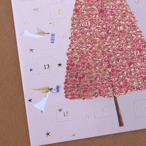 close-up-of-pink-tree-and-advent-calendar-windows