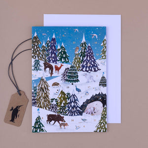 magical-pond-greeting-card-with-advent-calendar-windows-and-white-envelope