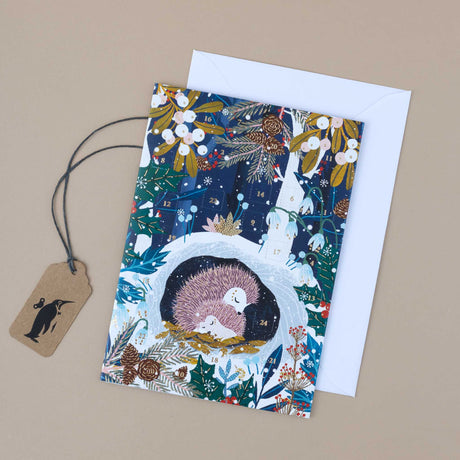 wild-wood-hideaway-greeting-card-two-hedgehogs-with-advent-calendar-windows-and-white-envelope