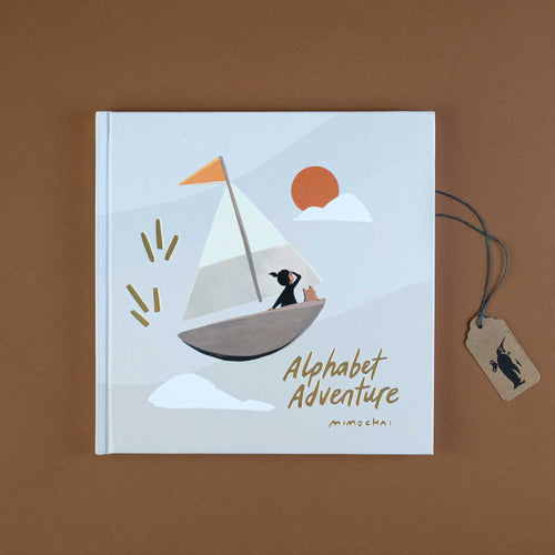 front-cover-alphabet-adventure-book-with-girl-sailing-and-gold-foil-lettering