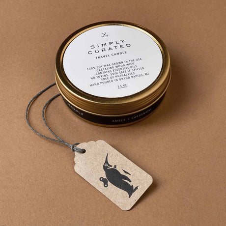 travel-size-candle-in-gold-tin-with-white-label