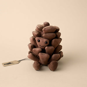 amuseable-pine-cone-stuffed-animal-with-smiling-face-and-corduroy-feet