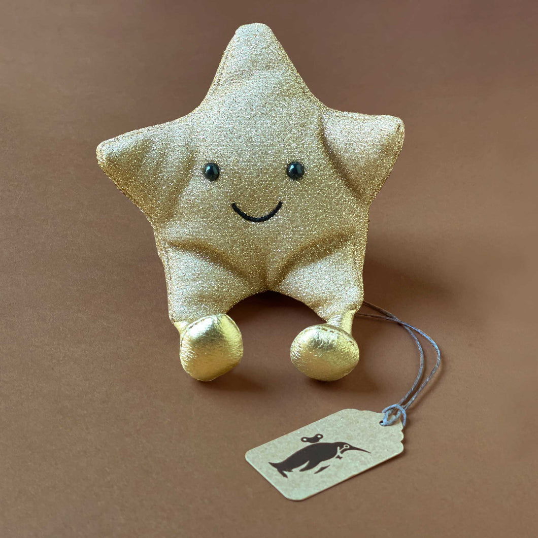 shiny-gold-stuffed-star-with-gold-boots-and-smiling-face