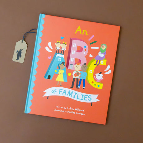    an-abc-of-families-book-red-cover-with-children-letters-and-families-illustrations
