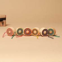 Load image into Gallery viewer, all-wooden-yo-yos-lined-up