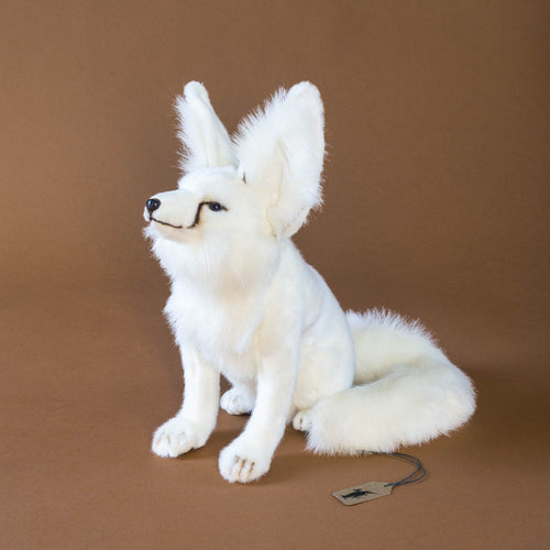 arctic-fox-sitting-realistic-stuffed-animal