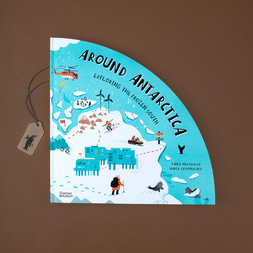 square-format-book-with-round-corner-on-top-showing-antarctica-and-some-penguins-seals-and-reserach-center
