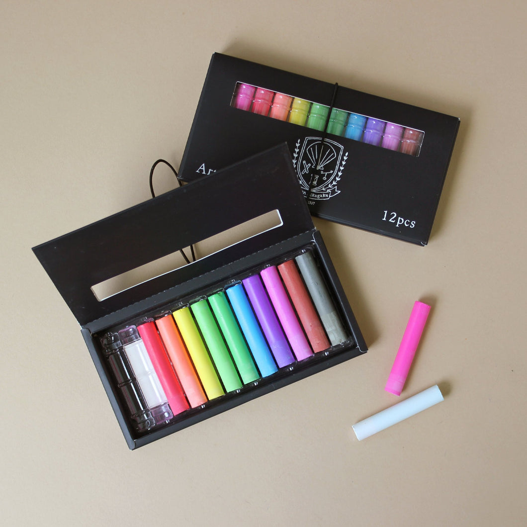 black-box-with-art-chalk-in-vibrant-colors