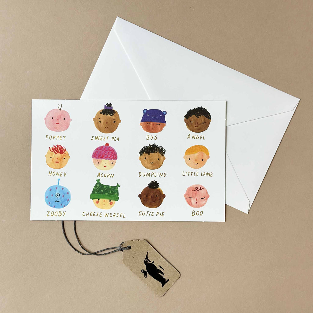 Correspondence Card Kit | Baby Face  with a card showing a watercolor illustration of baby faces.