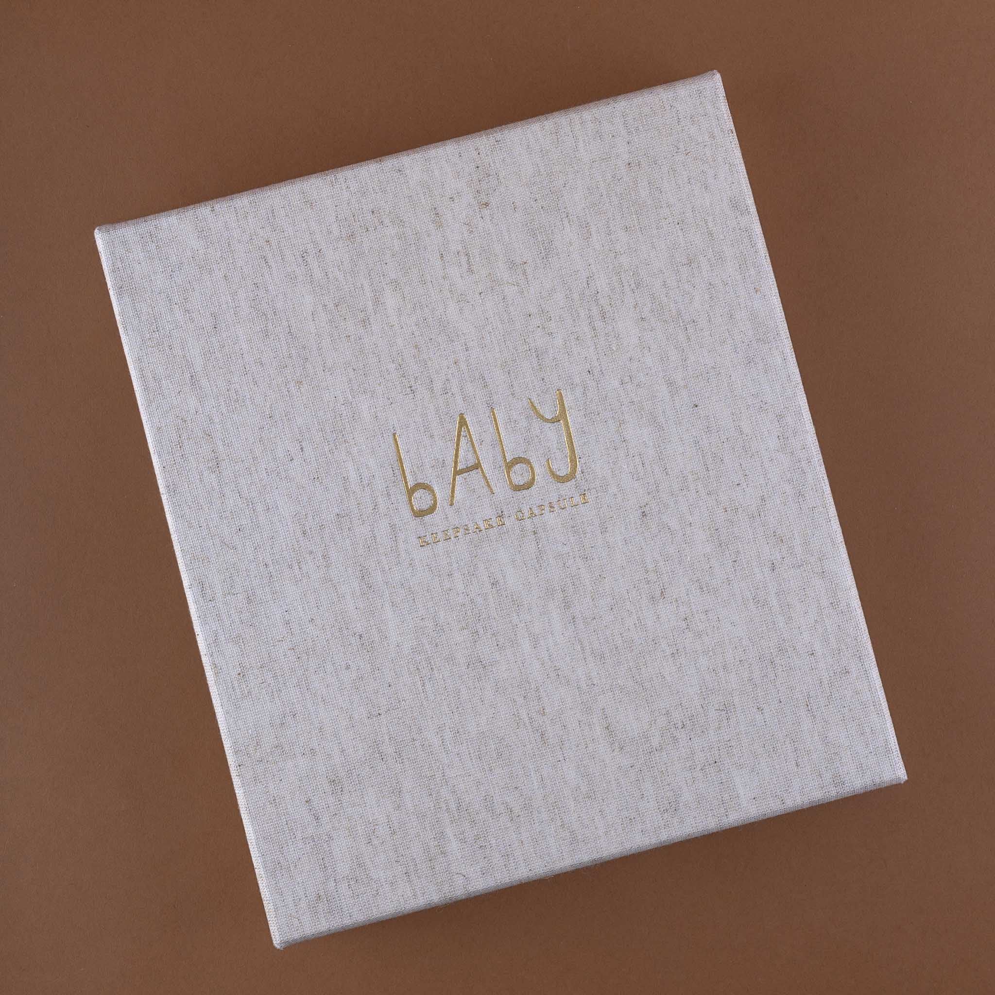 beige-cloth-covered-box