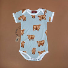 Load image into Gallery viewer, baby-onesie-in-grey-color-with-red-brown-highland-cow-pattern-and-white-contrasting-edging