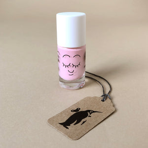 baby-pink-nail-polish-in-glass-bottle-with-sleeping-face