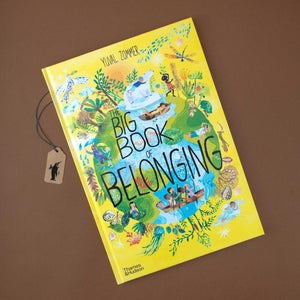 cover-of-big-yellow-book-showing-kids-around-the-worl-doing-things-in-nature