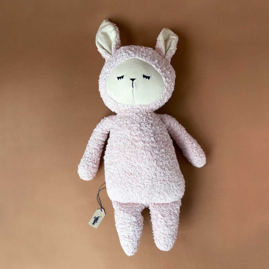 big-pink-rabbit-doll-with-closed-eyes