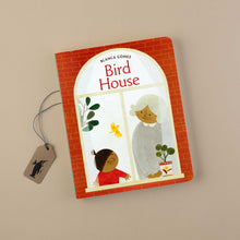 Load image into Gallery viewer,    bird-house-board-book-with-a-yellow-bird-flying-between-grandma-and-child