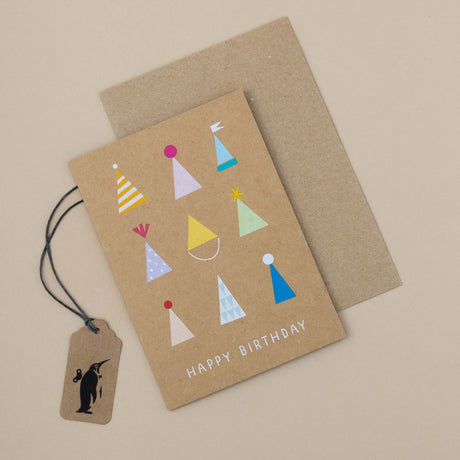 kraft-paper-greeting-card-happy-birthday-with-multi-color-party-hats