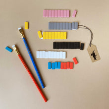 Load image into Gallery viewer, blackwing-eraser-set-in-5-colors-pink-grey-yellow-black-white-and-multi-blue-and-orange