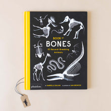 Load image into Gallery viewer, front-cover-book-of-bones-showing-illustrated-animal-skeletons