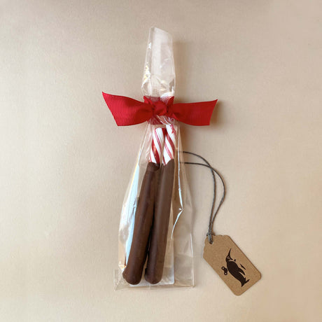 chocolate-dipped-peppermint-sticks-in-bag-with-red-ribbon