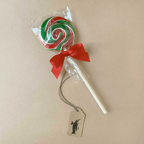 red-and-green-swirl-lollipop-on-white-stick-tied-with-red-ribbon