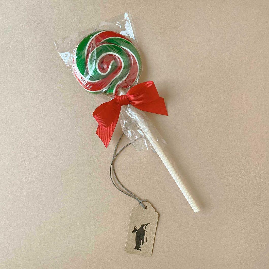 red-and-green-swirl-lollipop-on-white-stick-tied-with-red-ribbon