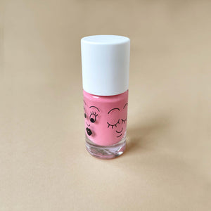 creamy-pink-nail-polish-with-line-drawn-face-illustrations