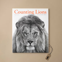 Load image into Gallery viewer, counting-lions-book-front-cover-with-sketched-lion-portrait