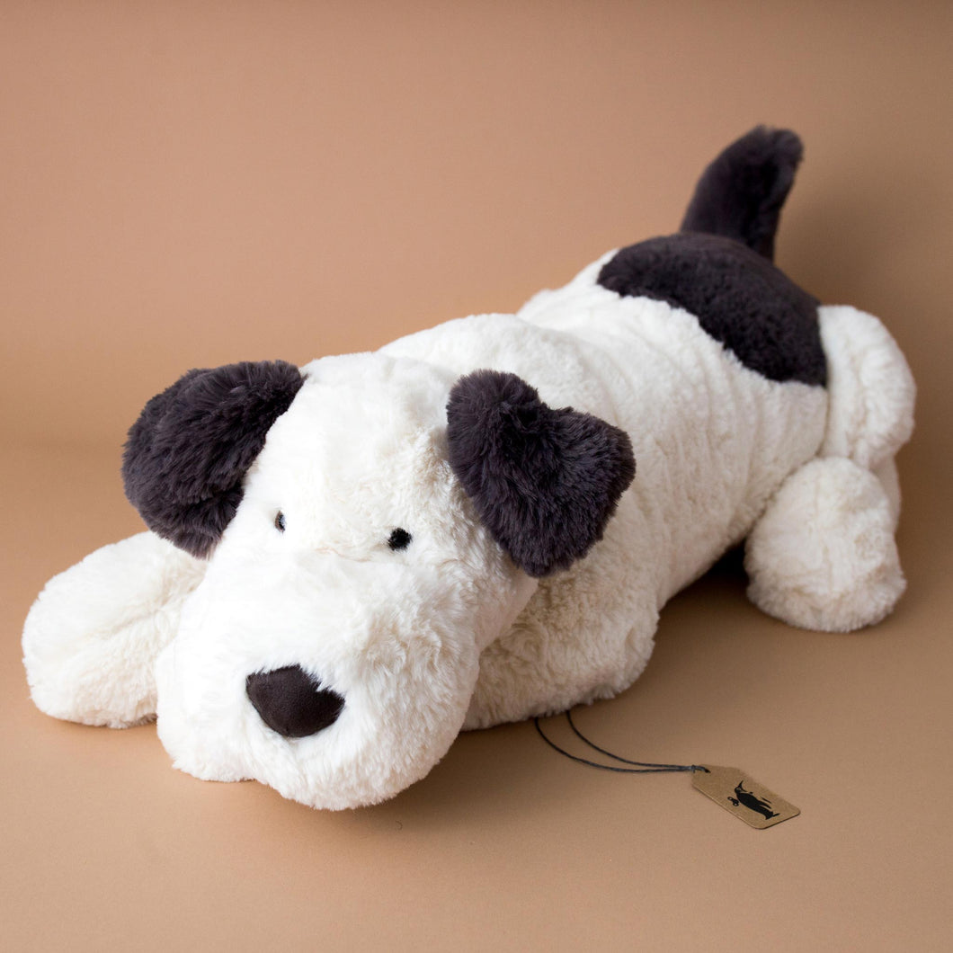 huge-dashing-dog-stuffed-animal-white-with-grey-spots-in-laying-position