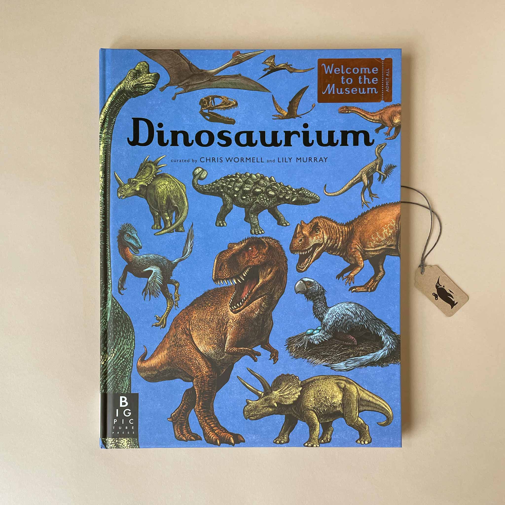 dinosaurium-book-cover-showcasing-various-dinosaurs-against-blue-background