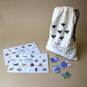 discover-the-world-puzzle-pieces-and-cloth-bag