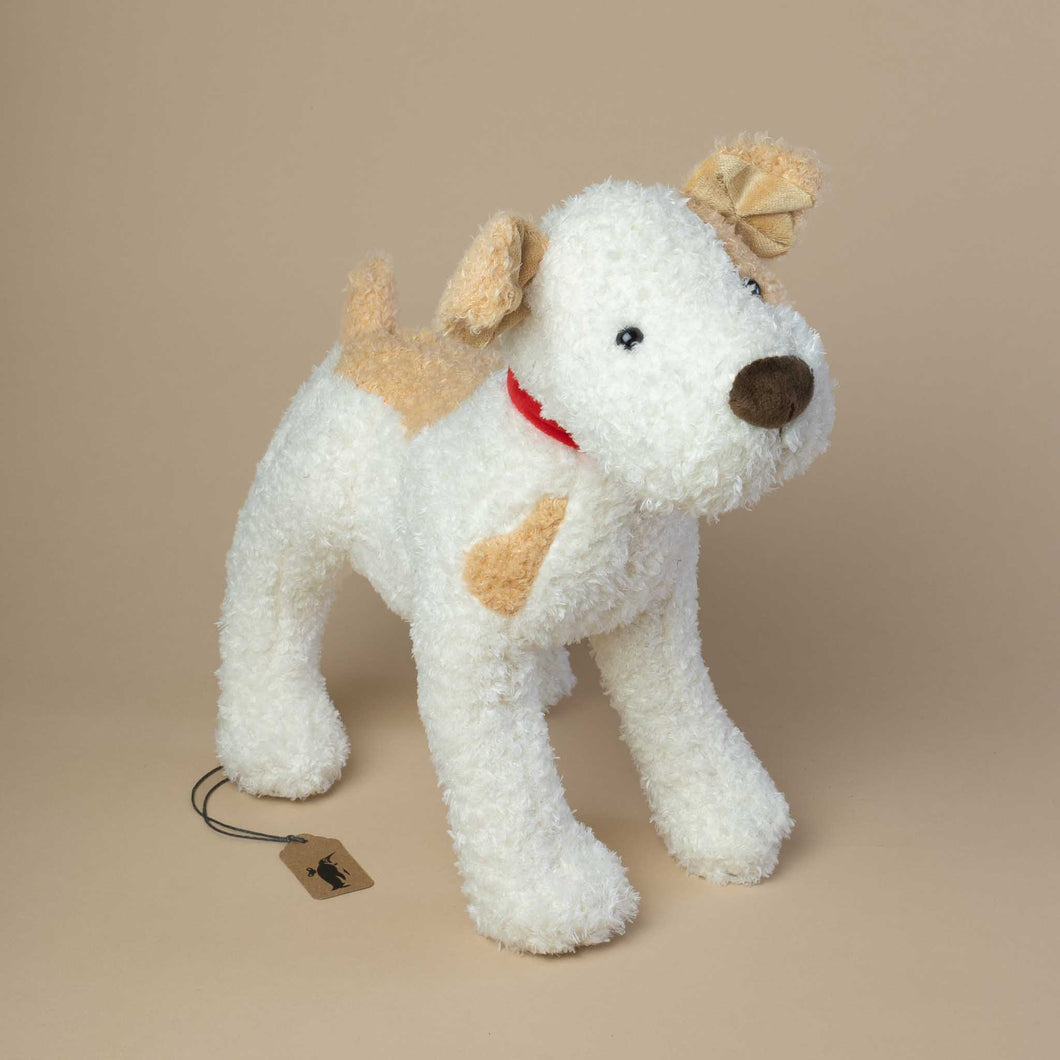bronw-and-white-stuffed-dog-with-red-collar