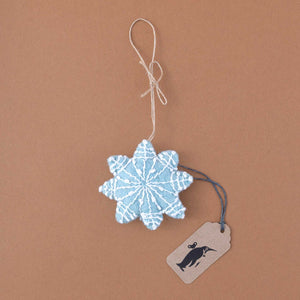 light-blue-felt-snowflake-ornament-with-white-stitching