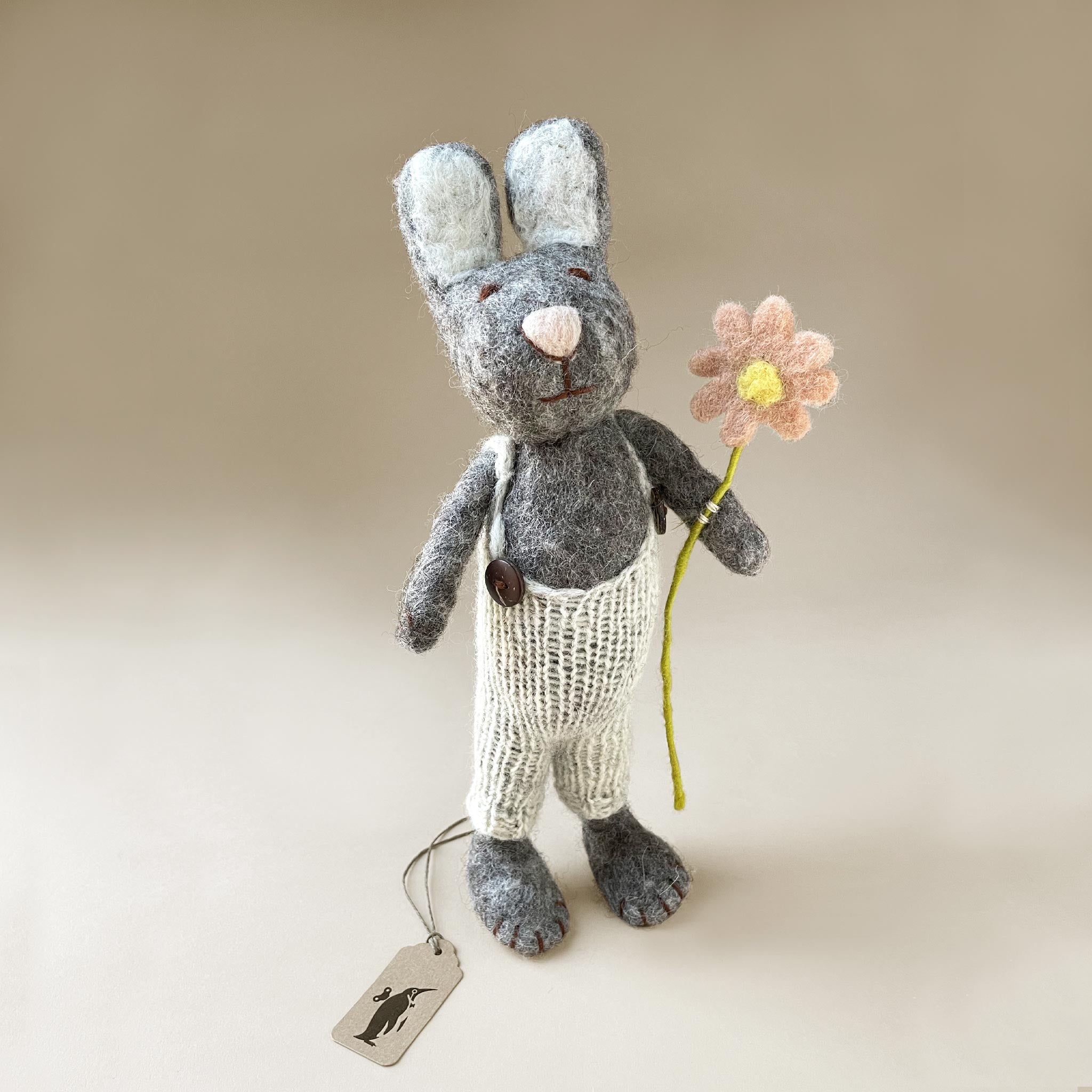 felted-grey-rabbit-doll-with-oatmeal-overalls-holding-blush-flower