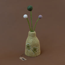 Load image into Gallery viewer, felt-vase-ochre-florals-with-example-pom-felt-white-green-and-lavendar-flowers