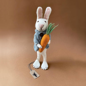 felted-white-rabbit-doll-with-blue-jacket-holding-carrot