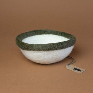 cream-colored-felt-bowl-with-olive-green-rim
