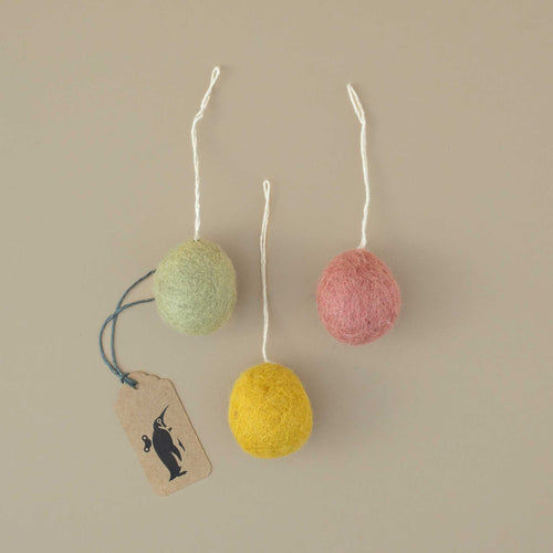 three-felted-eggs-in-green-yellow-and-pink